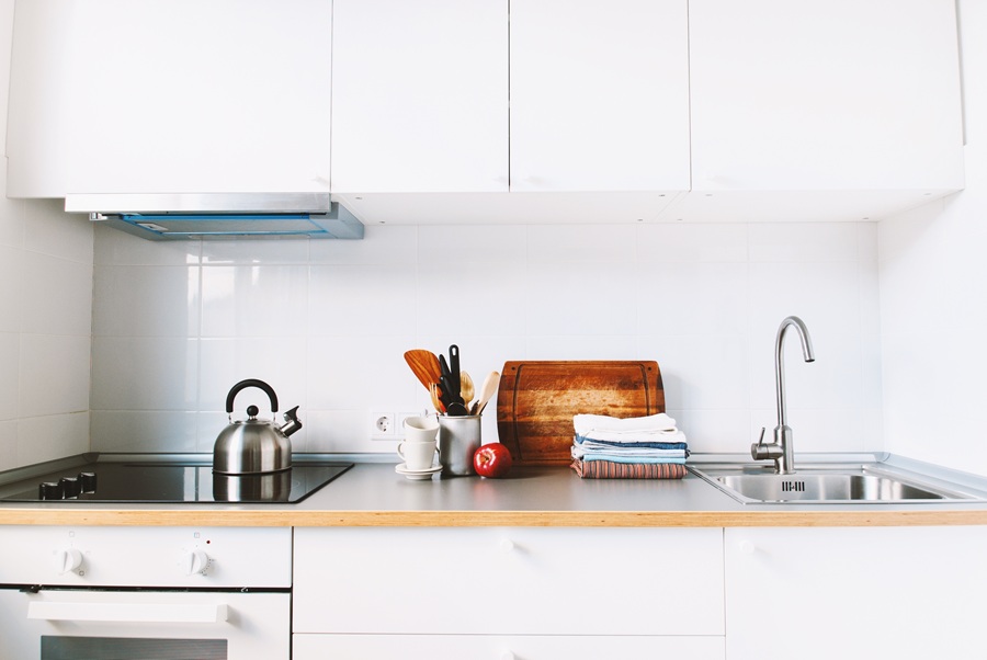 White Kitchen Interior Accessories Dishes Staff Apple Grocery Products Stand on Table Details Small kitchen
